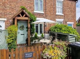 The Hayloft, Wisteria Cottage，位于南特威奇的酒店