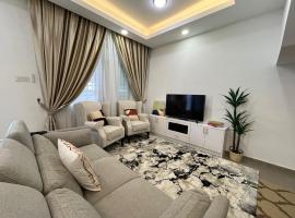 Naura Homestay Taman Scientex Kundang Jaya, Rawang，位于Pengkalan Kundang的酒店