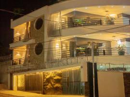 Okapi Residence Resort，位于戈马的带停车场的酒店