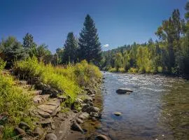 Riverfront Home with Hot Tub about 19 Mi to Wolf Creek!
