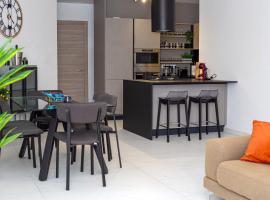 Modern Hennessy Apartment，位于圣朱利安斯的酒店