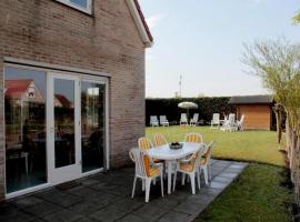 Appealing bungalow with garden，位于布雷斯肯斯的酒店