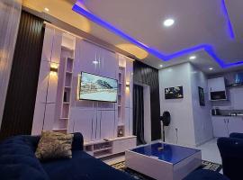 JKA 2-BEDROOM-Apt 24HRS POWER Unlimited WIFI , GARDEN PATIO AREA,FREE DAILY HOUSEKEEPING