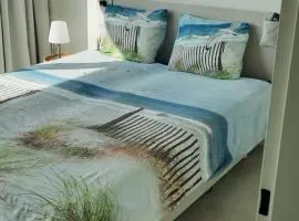 Cozy apartment with sea view and parking place