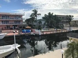 Beautiful Canal front Home with Above Ground Pool, Dock and Fish Station home