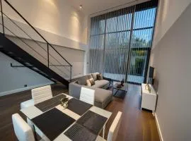 Luxury loft con jardín cerca del aeropuerto