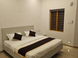 Thaal Residency Trikaripur-HALA GROUPS，位于Kokkānisseri的酒店