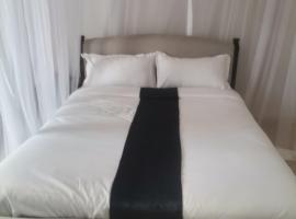 Iman Hotel，位于Mutomo的酒店