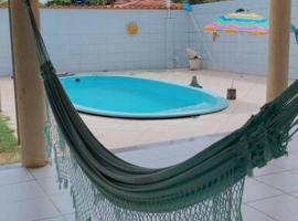 Aconchegante casa na Ilha de Itaparica，位于伊塔帕里卡岛维拉克鲁兹的酒店
