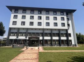 Denizli Öğretmenevi，位于帕莫卡莱的酒店