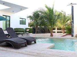 Villas Miland - San Benito Beach，位于San Benito的酒店