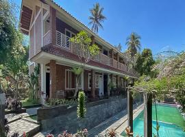 RedDoorz near Taman Bunga Nusantara，位于Pasirhuni的酒店