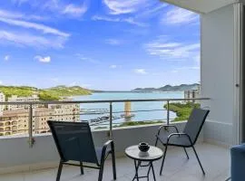 Luxury Lagoon-View Condo Steps to Beach