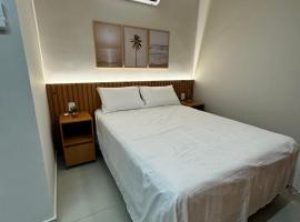 Flat Pé na Areia Iriri - Conforto a 3 Min da Praia，位于安谢塔的酒店