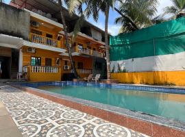 Aura rooms & swimming pool, calangute，位于卡兰古特的酒店