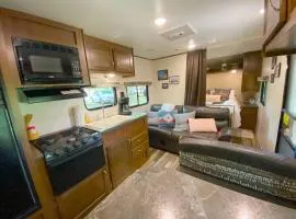 RV located on private property, providing access to the Guadalupe River, accommodates up to 4 guests