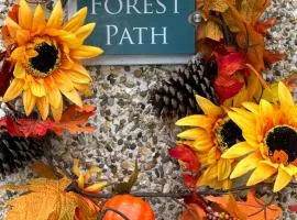 Forest Path luxury Studio Apartment with large bedroom bathroom and sauna Sleeps up to 4