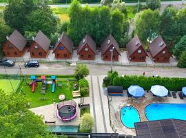 OW "Domki Matiaszówka" z PODGRZEWANYMI BASENAMI, kąpieliskiem ze zjeżdżalnią wodną, ogrodzonym placem zabaw i boiskiem，位于波拉齐克的酒店