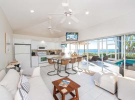Pools of the Kai 6 - Beachfront Condo with Private Pool Atrium, Modern Kitchen, and Outdoor Grill