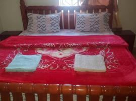 Cents Guest House, Entebbe katabi，位于恩德培的酒店