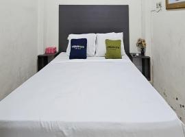 Urbanview Hotel Kharisma Banjarmasin，位于班贾尔马辛的酒店