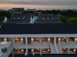 Huarongli Yangguang Jiangnan Private Sauna Courtyard，位于昆山的酒店