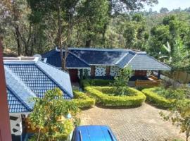 Kuruva Castle Cottages - Experience Nature & Wildlife，位于Chekadi的山林小屋