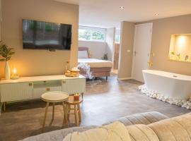 Wellnesshuisje Pocono cabin，位于拉纳肯的酒店