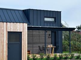 Lykke Huus Tinyhaus an der Nordsee mit Fasssauna，位于Schweiburg的酒店