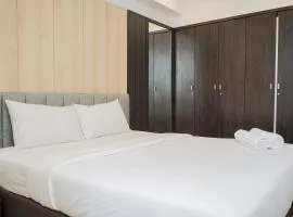 Comfy 1BR Apartment with Motorized Standing Desk at Branz BSD City By Travelio