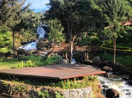 Fazenda Cachoeira Boutique Hotel，位于Caratinga的酒店