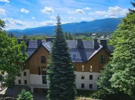 Pine Point Apartament with shared Pools, Jacuzzi, Sauna & Gym