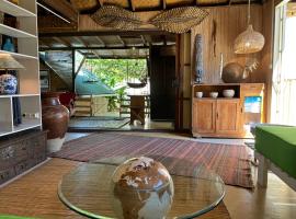 French Polynesia Secret House avec jacuzzi et piscine partagée，位于莫雷阿的酒店