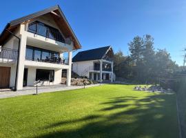 Domki i Apartamenty Wypoczynkowe z jacuzzi Lidzbark，位于利兹巴克的酒店