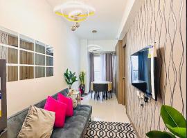 Cosy Deluxe Flat with Balcony near MOA，位于马尼拉的酒店