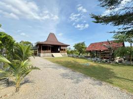 Joglo Bandulan Homestay Jogja，位于Ngemplak的酒店