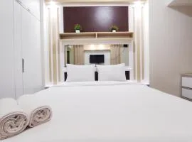 Tranquil Studio Apartment at Vida View Makassar By Travelio