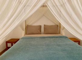 the village rua beach homestay，位于Rua的酒店