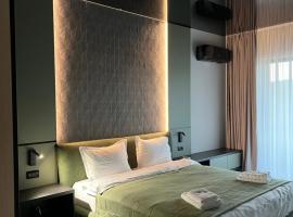 New Apartments Barlad，位于B&icirc;rlad的带停车场的酒店