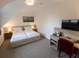 Cuxlandhotel Doppelzimmer 118，位于多鲁姆纽菲尔德的酒店