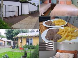 HOSTAL EL AROMO CHILLÁn，位于奇廉的旅馆