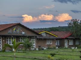 WOW STAYZ2 Pachmarhi Foothill Cottages，位于伯杰默里的酒店