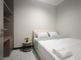 Urbanview Hotel at Pesona Guest House Jambi，位于Paalmerah的酒店