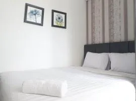 Best Deal and Comfy 2BR Apartment at Puri Mas By Travelio