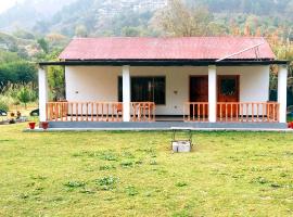 Round Bed Cottage At Country Club Balakot，位于Bālākot的度假村