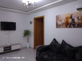 Location appartement cité les palmerais laouina，位于El Aouina的酒店