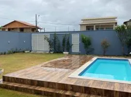 Casa Guriri com piscina ao lado da praia excelente localização