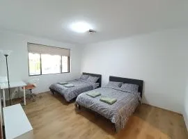 Cozy Family Room with Private Bathroom in Spacious Home - M8