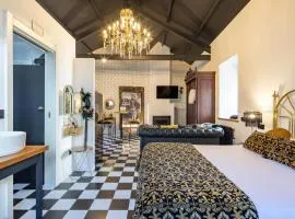 La Suite Años 20 Bañera, chimenea de leña y terraza