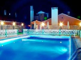 Hotel Puerta de Monfrague，位于马尔帕尔蒂达德普拉森西亚的酒店